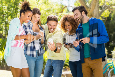 Group of friends taking a selfie with the mobile phone