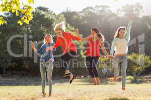 Group of friends having fun in park