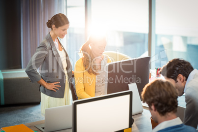 Business people working on computer