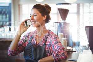 Waitress making a phone call