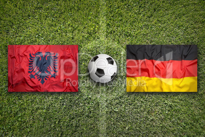 Albania vs. Germany flags on soccer field