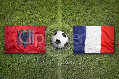 Albania vs. France flags on soccer field
