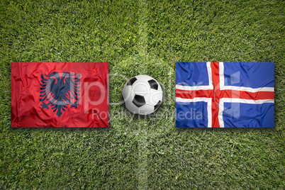 Albania vs. Iceland flags on soccer field