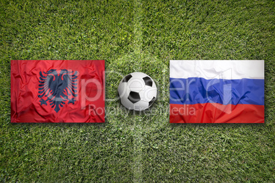 Albania vs. Russia flags on soccer field