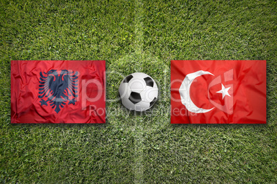 Albania vs. Turkey flags on soccer field