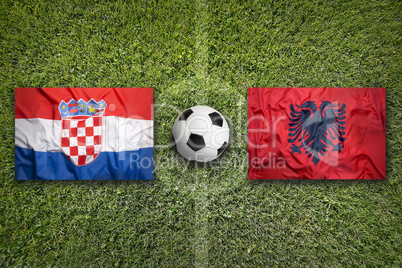 Croatia vs. Albania flags on soccer field