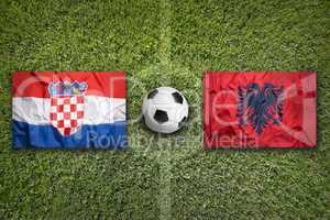 Croatia vs. Albania flags on soccer field