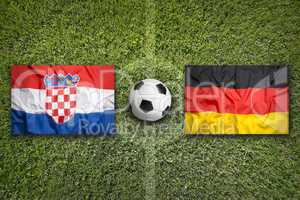 Croatia vs. Germany flags on soccer field