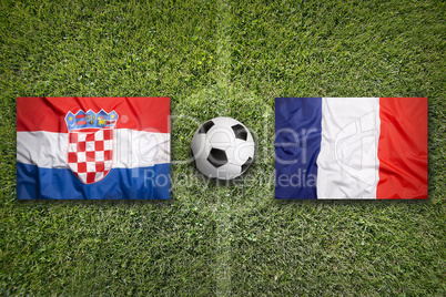 Croatia vs. France flags on soccer field