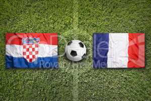 Croatia vs. France flags on soccer field