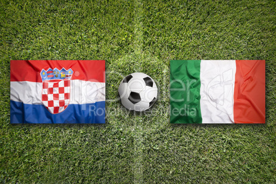 Croatia vs. Italy flags on soccer field