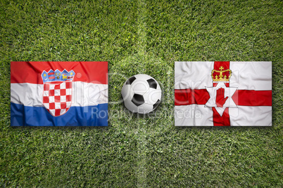 Croatia vs. Northern Ireland flags on soccer field