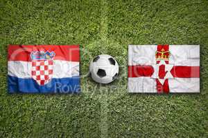 Croatia vs. Northern Ireland flags on soccer field