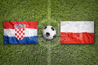 Croatia vs. Poland flags on soccer field