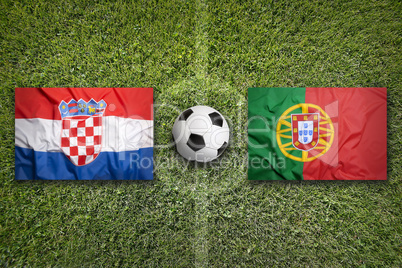 Croatia vs. Portugal flags on soccer field