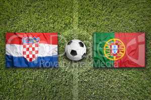 Croatia vs. Portugal flags on soccer field