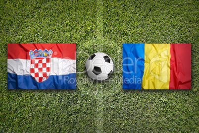 Croatia vs. Romania flags on soccer field