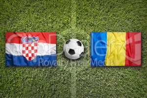 Croatia vs. Romania flags on soccer field