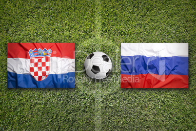 Croatia vs. Russia flags on soccer field