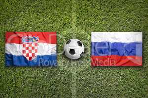 Croatia vs. Russia flags on soccer field