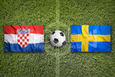 Croatia vs. Sweden flags on soccer field