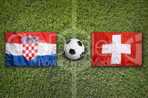 Croatia vs. Switzerland flags on soccer field