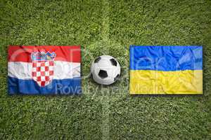 Croatia vs. Ukraine flags on soccer field