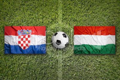 Croatia vs. Hungary flags on soccer field
