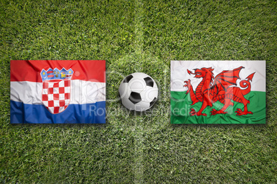 Croatia vs. Wales flags on soccer field
