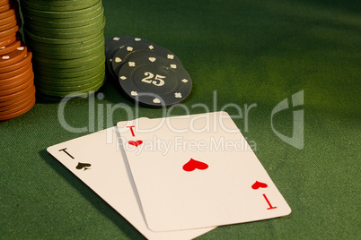 Cards with poker hand with chips