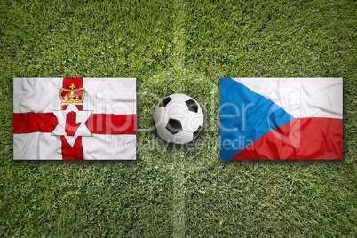 Northern Ireland vs. Czech Republic flags on soccer field
