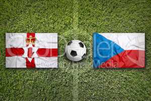Northern Ireland vs. Czech Republic flags on soccer field