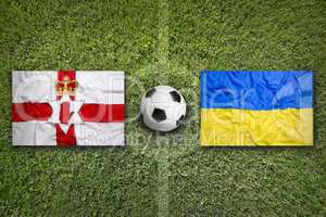 Northern Ireland vs. Ukraine flags on soccer field