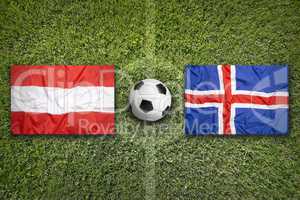 Austria vs. Iceland flags on soccer field