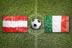 Austria vs. Italy flags on soccer field