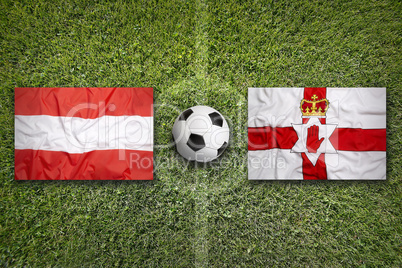 Austria vs. Northern Ireland flags on soccer field