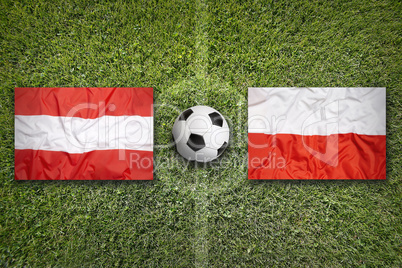 Austria vs. Poland flags on soccer field