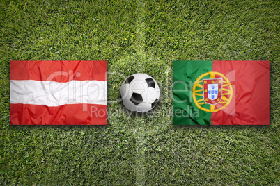 Austria vs. Portugal flags on soccer field