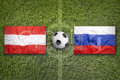 Austria vs. Russia flags on soccer field
