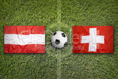 Austria vs. Switzerland flags on soccer field