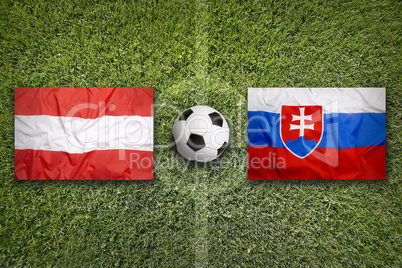 Austria vs. Slovakia flags on soccer field