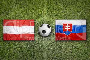 Austria vs. Slovakia flags on soccer field