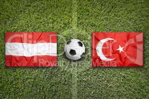 Austria vs. Turkey flags on soccer field