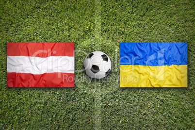 Austria vs. Ukraine flags on soccer field