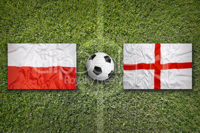 Poland vs. England flags on soccer field