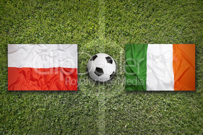 Poland vs. Ireland flags on soccer field