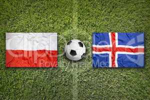 Poland vs. Iceland flags on soccer field
