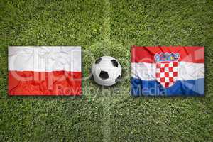 Poland vs. Croatia flags on soccer field