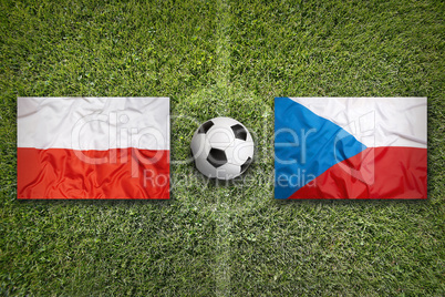 Poland vs. Czech Republic flags on soccer field