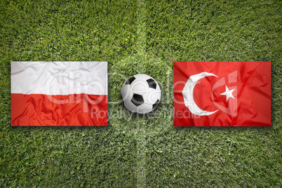 Poland vs. Turkey flags on soccer field